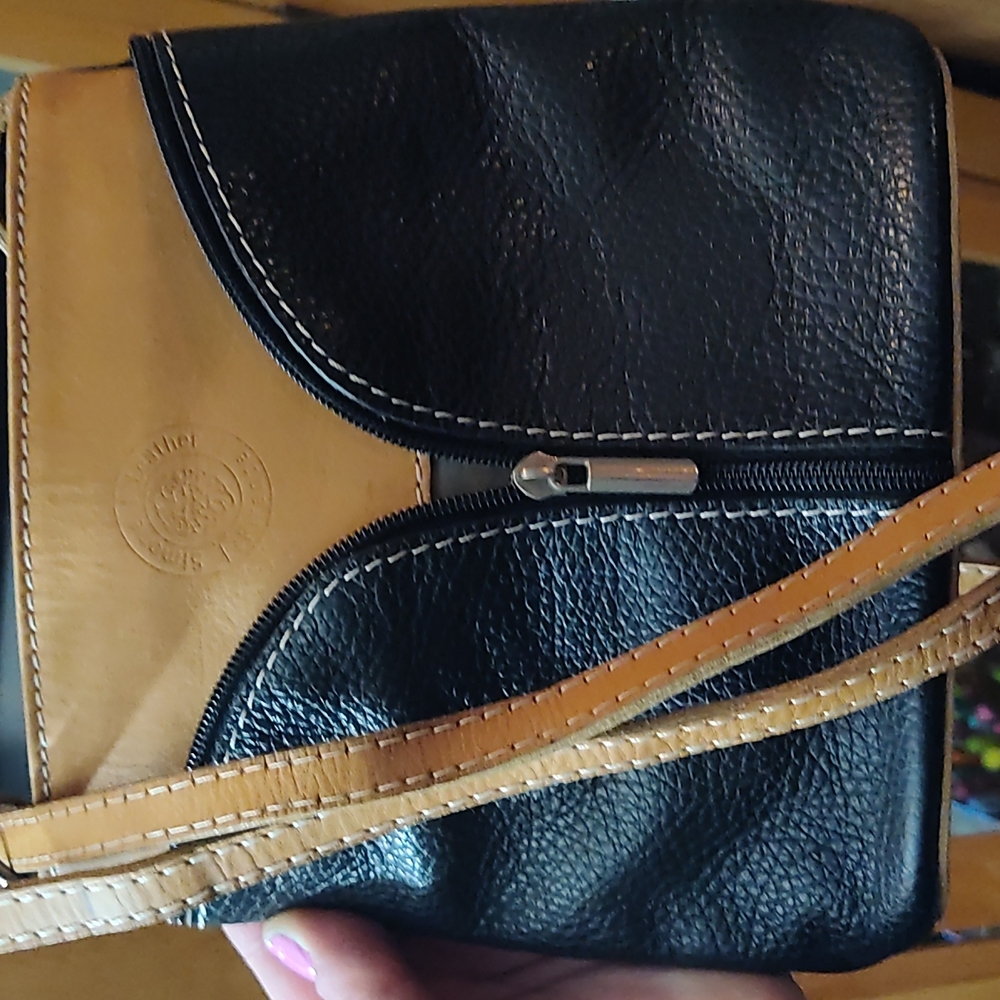Purchased in Italy. Black and cream leather firenze bag